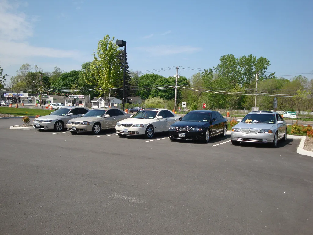 Mark VIII's Of The State Of NY club members at a car show